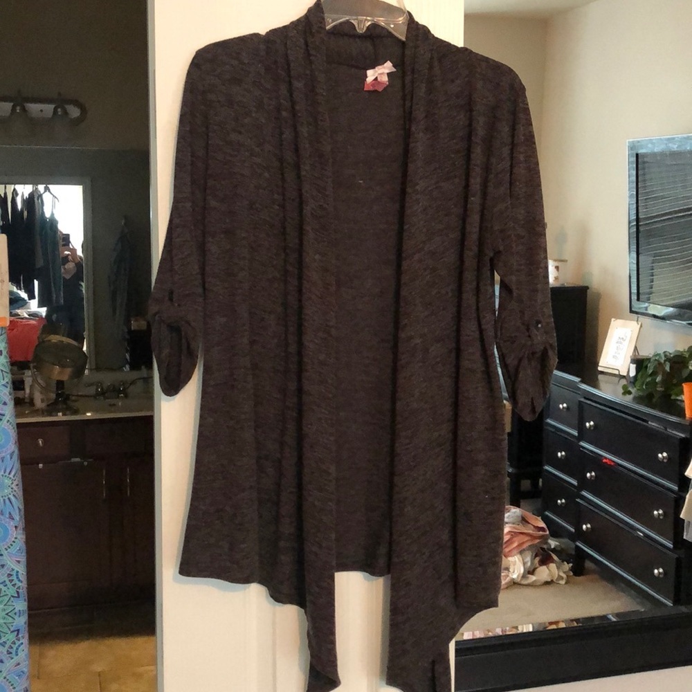Brown sweater cardigan.​